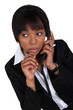 Photo: Woman paying attention during phone call Woman paying attention during phone call