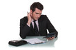 Office worker using calculator