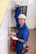 two electricians working