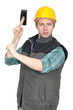 Worker with a sledgehammer