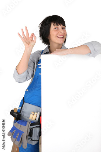 Photo: Manual worker with a blank board Manual worker with a blank board