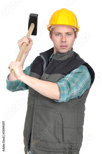 Photo: Worker with a sledgehammer Worker with a sledgehammer