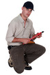 Man with vernier caliper