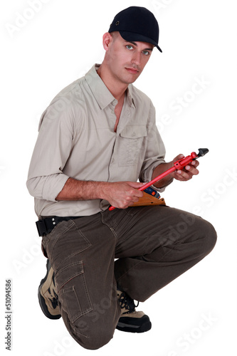 Photo: Man with vernier caliper Man with vernier caliper