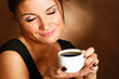 Portrait of a woman drinking coffee