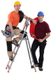 A team of tradesmen posing with their tools