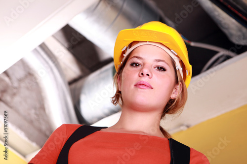 Photo: Woman in a hardhat Woman in a hardhat