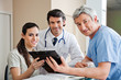 Medical Professionals Standing At Reception