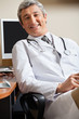 Happy Doctor In Clinic
