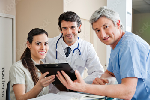 Photo: Medical Professionals Standing At Reception Medical Professionals Standing At Reception