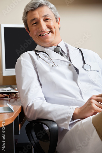Photo: Happy Doctor In Clinic Happy Doctor In Clinic