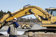 bulldozers, diggers and worker