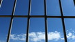 Prison bars and blue sky, dolly