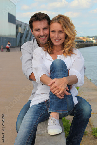 Photo: Couple by the waterside Couple by the waterside