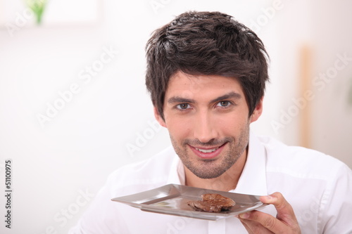 Photo: Man with a plate of steak Man with a plate of steak
