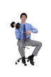Businessman lifting weights