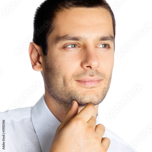 Photo: Portrait of thinking businessman, on white Portrait of thinking businessman, on white