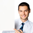 Happy businessman showing signboard, isolated