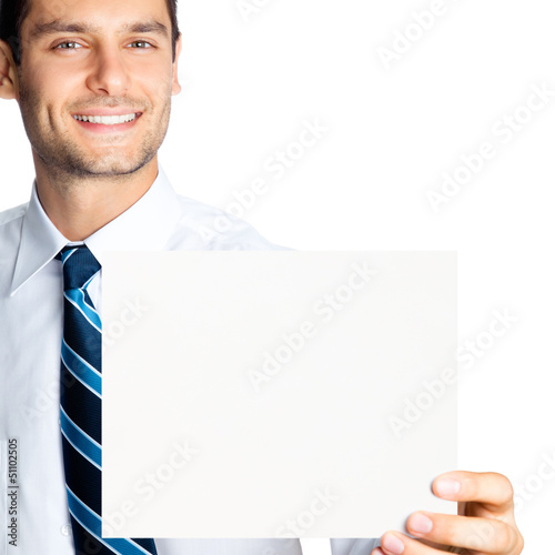 Photo: Happy businessman showing signboard, isolated Happy businessman showing signboard, isolated