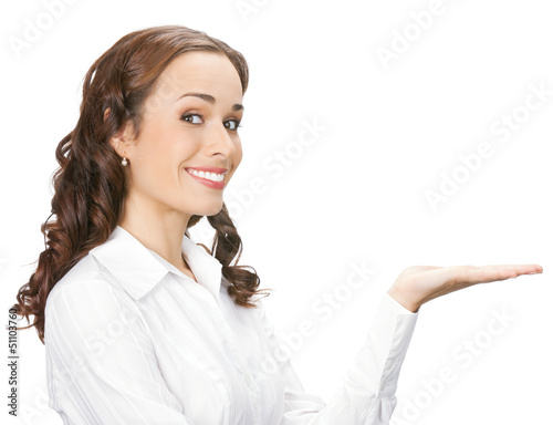Photo: Businesswoman showing, isolated on white Businesswoman showing, isolated on white
