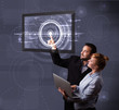 Young couple touching modern technology tablet