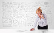 Pretty businesswoman planning and calculating various business i