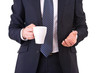 Businessman holding a cup of coffee.