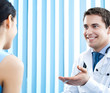 Portrait of smiling doctor and female patient