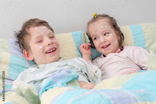 Photo: Two diseased children. Patients with smallpox symptoms. Two diseased children. Patients with smallpox symptoms.