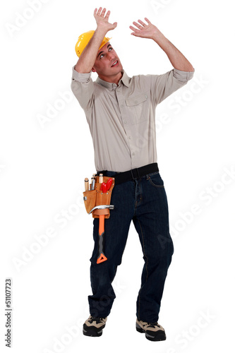 Photo: Builder lifting blank space Builder lifting blank space