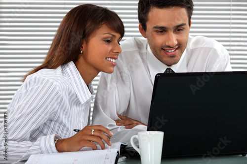 Photo: Attractive business couple Attractive business couple