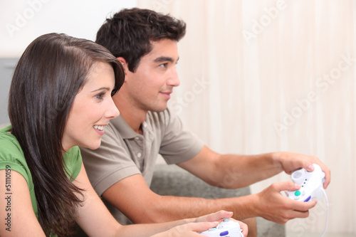 Photo: portrait of teenagers playing video game portrait of teenagers playing video game