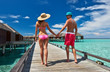 Couple on a beach jetty at Maldives