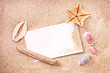 Foto: Message vierge, fond sable et coquillage Message vierge, fond sable et coquillage