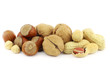 Mix of nuts - hazelnuts, walnuts and peanuts - on white