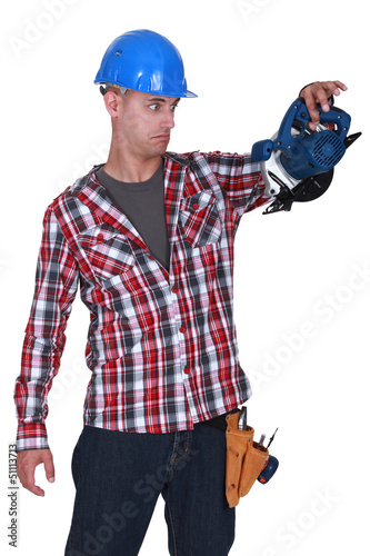 Photo: carpenter stunned at sander machine carpenter stunned at sander machine