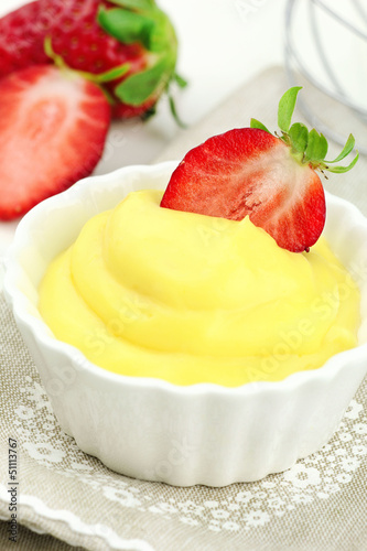 Photo: Delicious vanilla cream dessert with fresh strawberries Delicious vanilla cream dessert with fresh strawberries