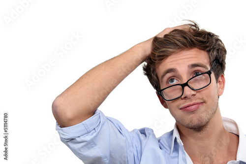 Photo: A disheveled man. A disheveled man.