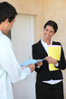 Man signing housing contract