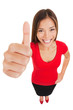 Thumbs up woman standing in full body length