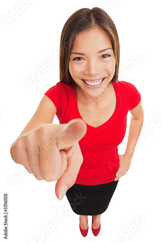 Photo: Woman pointing camera smiling happy Woman pointing camera smiling happy