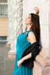 Young brunette in dress