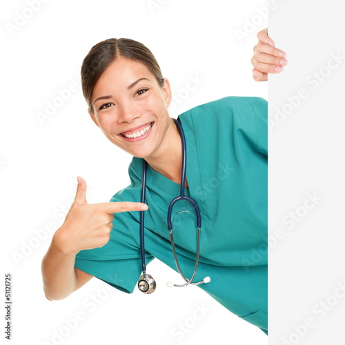 Photo: Medical sign person - woman showing blank poster Medical sign person - woman showing blank poster