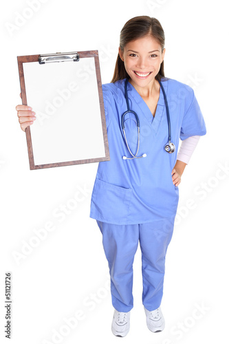 Photo: Medical nurse woman or doctor showing clipboard Medical nurse woman or doctor showing clipboard
