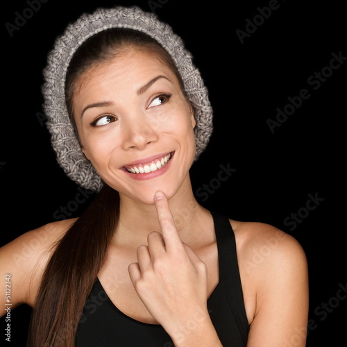 Photo: Thinking Asian woman modern hipster looking Thinking Asian woman modern hipster looking