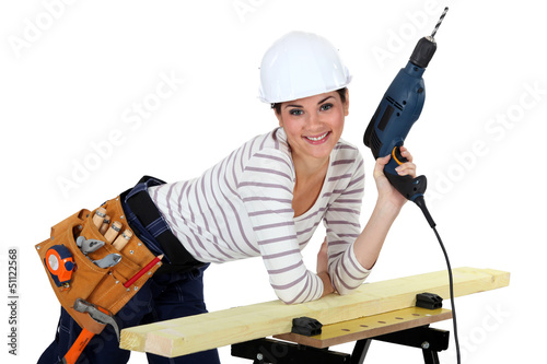 Photo: Woman with a power drill Woman with a power drill