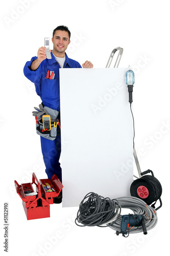 Photo: electrician showing phone electrician showing phone