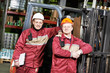warehouse workers in front of forklift