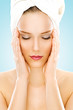 Beauty with towel isolated on blue