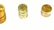 Camera pans over stacks of coins